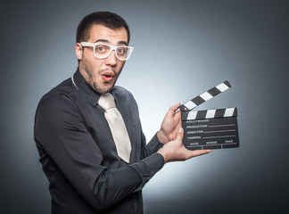 Man with movir clapper board