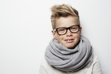 Boy in scarf and spectacles, portrait © sanneberg