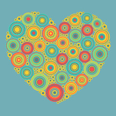 Bright abstract heart on blue background