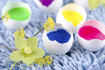 Easter decoration with egg shells and filled with tempera paints