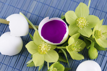 Easter decoration with egg shells and filled with tempera paints