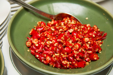 Sliced red chili peppers close up