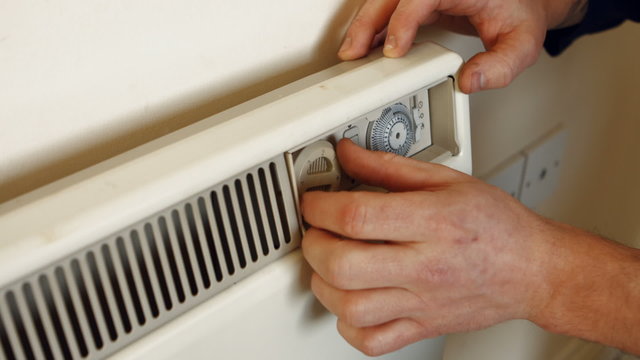 Man fixing the heating