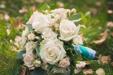 wedding bouquet on green grass