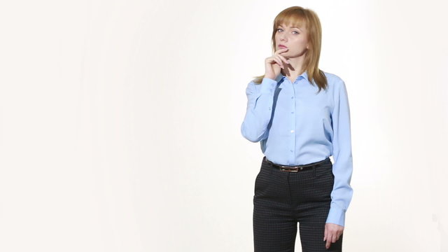 chin stroking. decision and skepticism. girl in pants and blous.  Isolated on white background. body language. women gestures. nonverbal cues