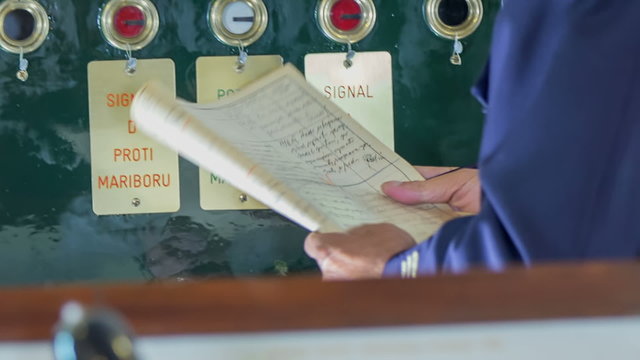 Pressing the red battens at the train control 