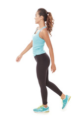 sporty styles woman in walking pose