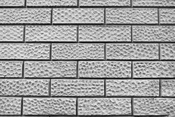 Abstract weathered texture stained old bumped stucco light gray background