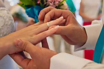 Fototapeta premium Wedding couple hands with rings