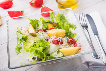 salad with tomato, meat and potato
