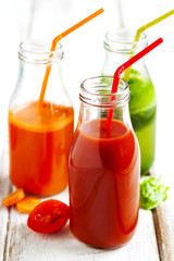 Fototapeta na wymiar Fruits and vegetable juice in bottle.