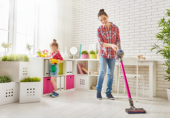 family cleans the room