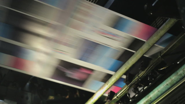High speed paper on the production line of a printing factory