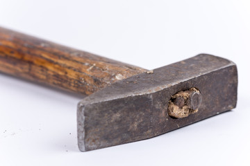 Closeup macro view of old rusty retro hammer