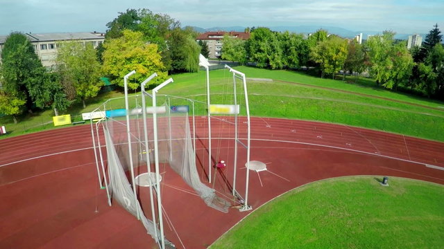 Hammer throw at a running track court