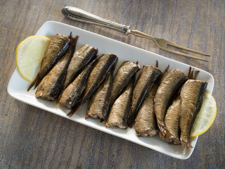 Rye bread with sprats and lemon