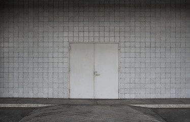 steel door and concrete surrounding.