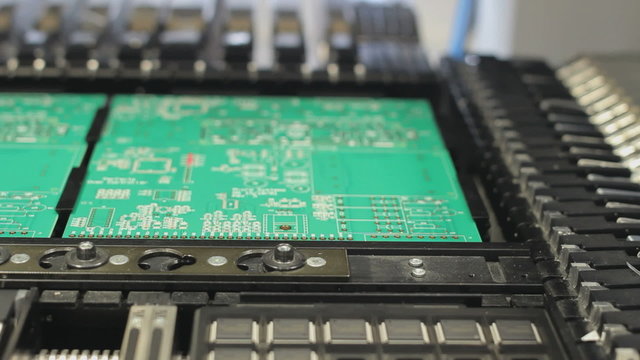 Surface Mount Technology (Smt) Machine places elements on circuit boards
