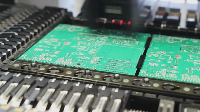 Surface Mount Technology (Smt) Machine places elements on circuit boards