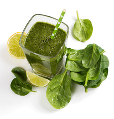 Green smoothie from spinach isolated on white background