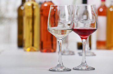 Wine glasses with red and white wine, closeup