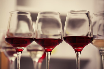 Wine glasses with red and white wine, closeup