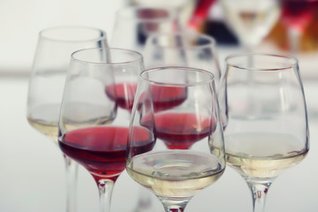 Wine glasses with red and white wine, closeup