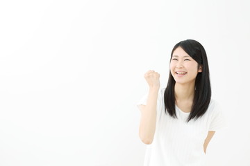ガッツポーズ・若い女性