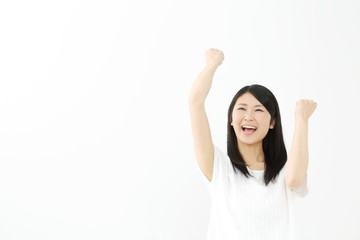 ガッツポーズ・若い女性