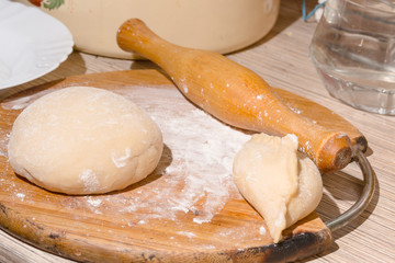 dough for pies and pie ready to board