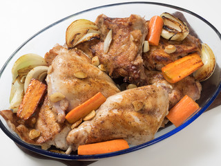 Roasted rabbit with herbs, vegetables and white wine sauce