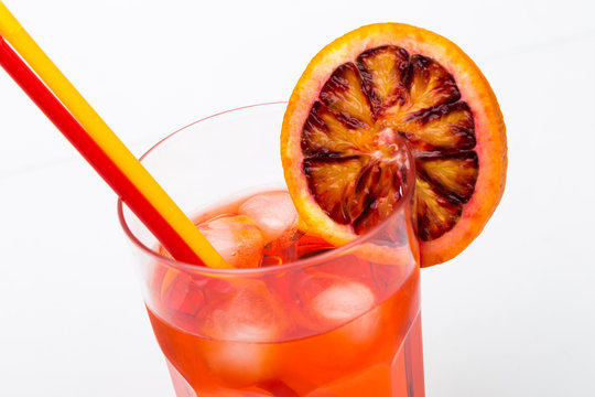 Aperol spritz aperitif alcoholic cocktail with orange slices and