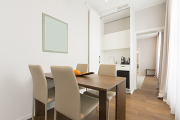 Dining room interior in hotel apartment