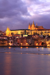 Colorful Prague gothic Castle above the River Vltava with Charles Bridge in the Evening, Czech Republic