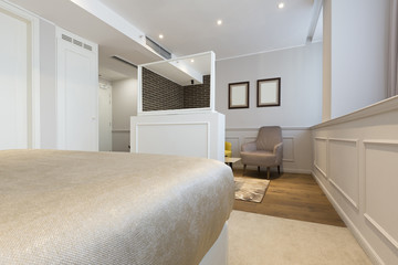 Interior of a double hotel bedroom in the morning