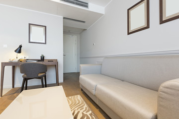 Naklejka na ściany i meble Interior of a modern hotel apartment