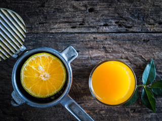 Still life Orange Juicer with orange juice.