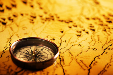 Close up compass on the old map