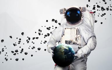 Astronaut in outer space modern art. Elements of this image furnished by NASA.