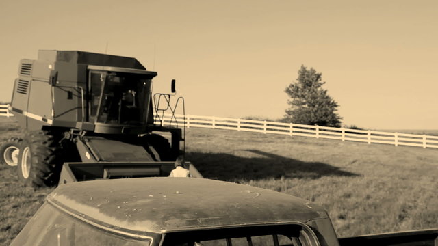 Portrait of farmer with pickup truck