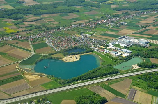 aerial view of the village of Gamshurst Achern with the quarry and industrial area, Autobahn in the foreground, Baden Germany