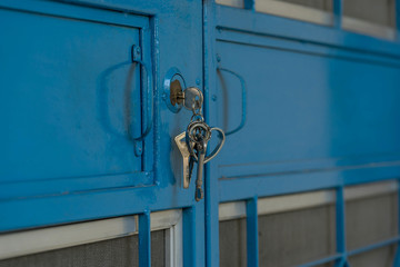 blue steel door and key