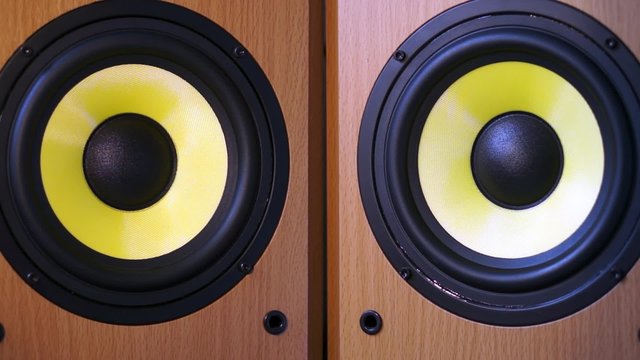 A pair of powerful audio speakers system. Loud music movement.