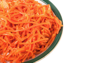 Korean carrots in  plate on a white background