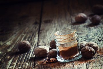 Ground or whole nutmeg, selective focus