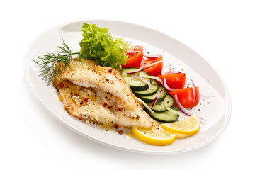 Fish dish - roast cod fillet and vegetables 