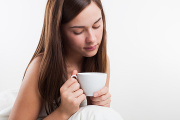 young beautiful woman in a blanket