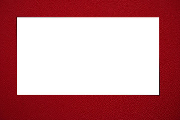 white paper on red velvet background