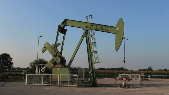 Pumpjack silhouette in Germany with Oil industry pums oil