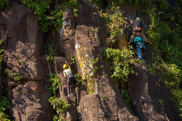 Rock climber in Iguazu national park basalt rocks